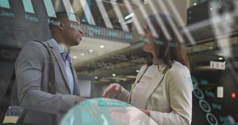 Diverse Professionals Discussing Work with Financial Data Overlay