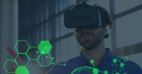 Businessman Experiencing Virtual Reality with Futuristic Interface - Download Free Stock Images Pikwizard.com