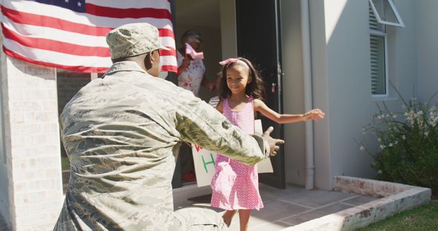 Image of african american soldier back to his family. American patriotism, armed forces and family life.
