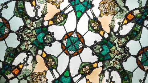 Symmetrical Stained Glass Artwork in Church Setting