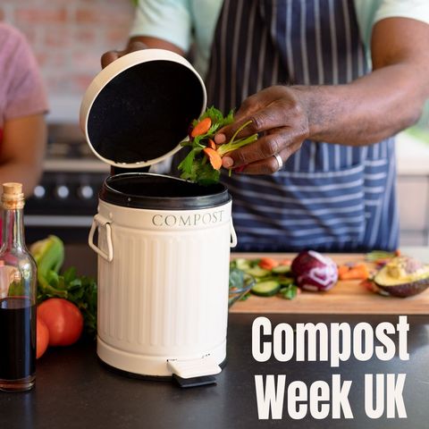 Couple composting organic kitchen waste for sustainable living