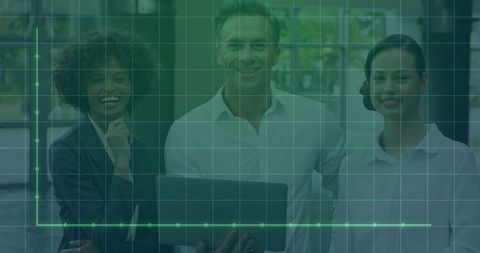 Business team reviewing analytics on laptop with green grid graph overlay