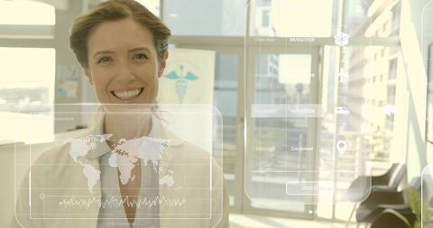 Smiling doctor presenting digital health interface in modern medical office