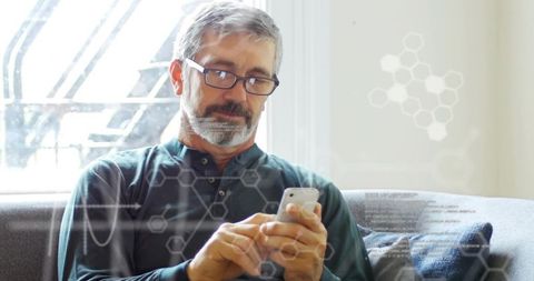 Senior Man Using Smartphone with Digital Overlays