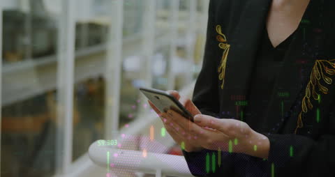 Businesswoman Analyzing Data on Smartphone in Office Setting