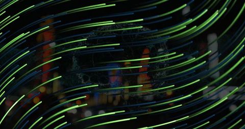 Green Streaks over Night Cityscape Symbolizing Dynamic Technology - Download Free Stock Images Pikwizard.com