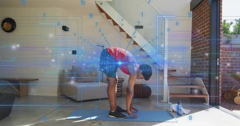 Man Performing Forward Fold Yoga with Futuristic AR Fitness Overlay in Sunlit Living Room
