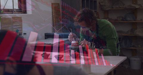 Double Exposure of Potter in Studio with COVID-19 Statistics Overlay