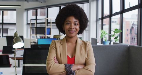 Confident Businesswoman Smiling in Office Setting