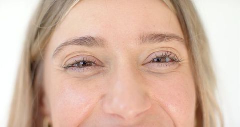 Close-Up of Smiling Woman with Natural Beauty and Blonde Hair