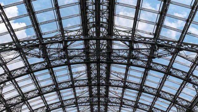 Arched Steel Glass Roof with Riveted Trusses and Skylights, Vaulted Lattice Canopy