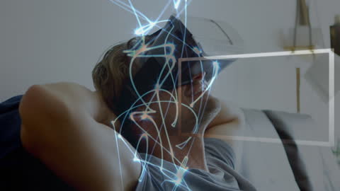 Relaxed Man Experiencing Virtual Reality Light Trails