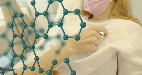 Reclining patient undergoing chest exam with stethoscope and molecular network overlay