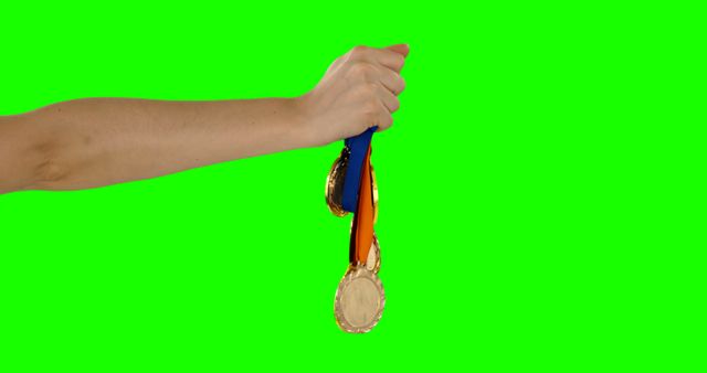 Hand Holding Medals on Green Screen Background - Download Free Stock Images Pikwizard.com