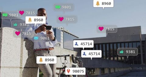 Man Interacting with Smartphone Notifications on Rooftop