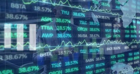 Financial analysts collaborating with digital stock market display