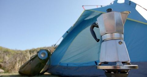 Moka Pot Brewing Coffee by Mountain Camping Tent