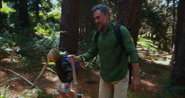 Father and Daughter Hiking Together in Lush Forest - Download Free Stock Images Pikwizard.com