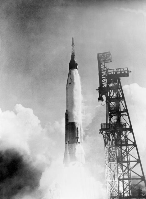 Mercury-Atlas 6 spacecraft launching from Cape Canaveral, February 20, 1962. The mission made astronaut John Glenn the first American to orbit the Earth. Perfect for historical contexts, space exploration documentaries, educational materials on NASA missions, or science and technology publications.