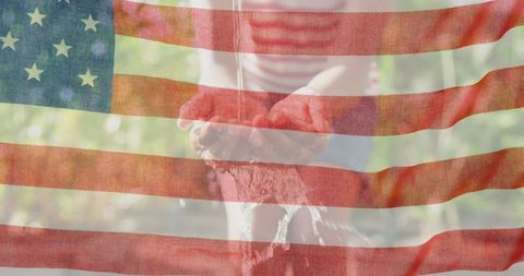 American Flag Overlay on Child Washing Hands for Independence Concept