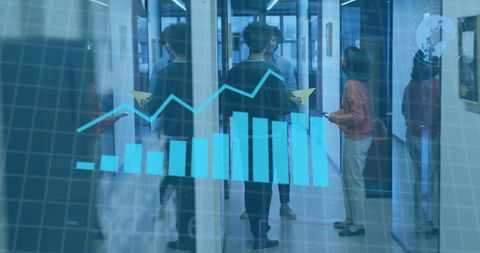 Digital graphs overlay diverse business team discussion