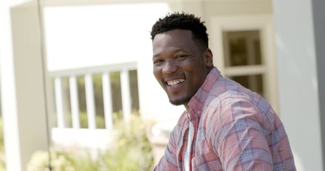 Smiling Man Relaxing Outdoors on a Sunny Day - Download Free Stock Images Pikwizard.com