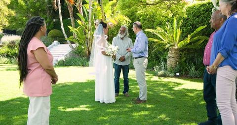 Outdoor Garden Wedding Ceremony with Diverse Seniors Celebrating
