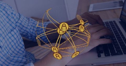 Man typing on laptop with digital network interface overlay