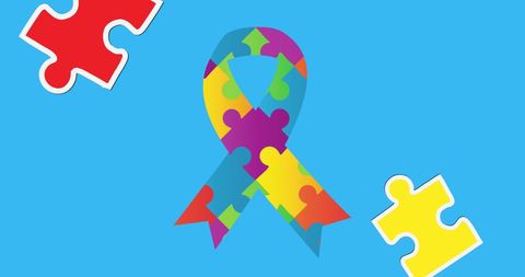 Colorful Puzzle Ribbon for Autism Awareness on Blue Background - Download Free Stock Images Pikwizard.com