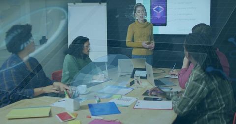 Presenting Mobile App Prototype to Team in Modern Conference Room for UX Review