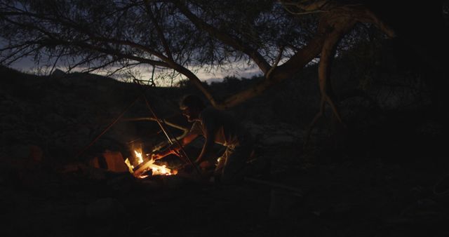 Camping at Dusk with Bonfire in Dark Forest - Download Free Stock Images Pikwizard.com