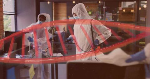 Hazmat crew disinfecting modern office lobby wearing full ppe using backpack sprayer