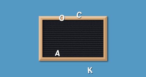 School communication board with scattered letters