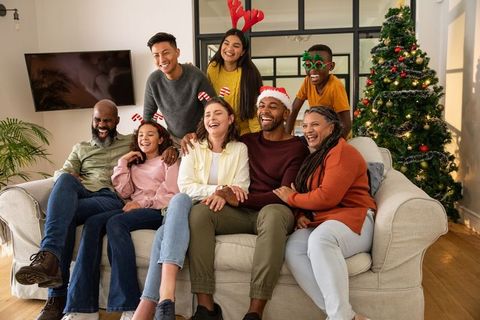 Cheerful Family Smiling Together During Christmas Celebration