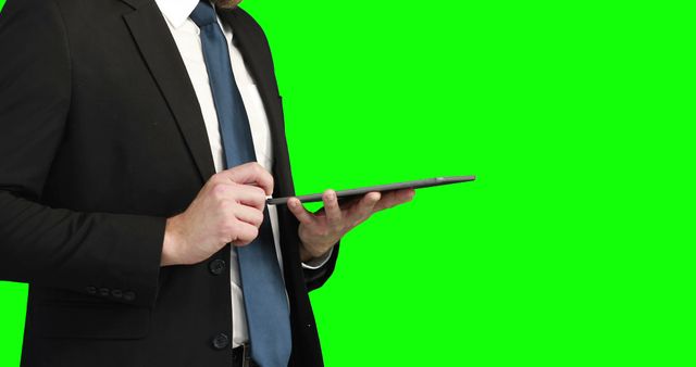 Businessman Using Digital Tablet Isolated on Green Screen - Download Free Stock Images Pikwizard.com