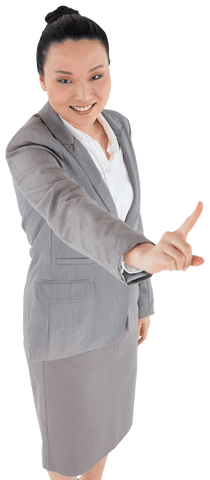 Smiling Asian Businesswoman Pointing Upward Front View Transparent Background