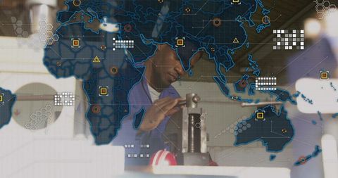 Industrial technician adjusting cylinder press with global data overlay and digital grid