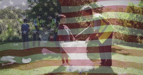 Community volunteers collecting litter in scenic park for conservation