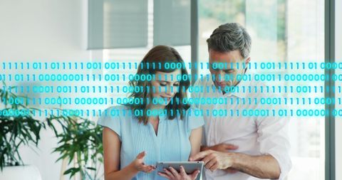 Coworkers Analyzing Data on Tablet with Binary Code Overlay - Download Free Stock Images Pikwizard.com