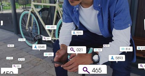 Man Checking Smartphone with Floating Social Media Icons