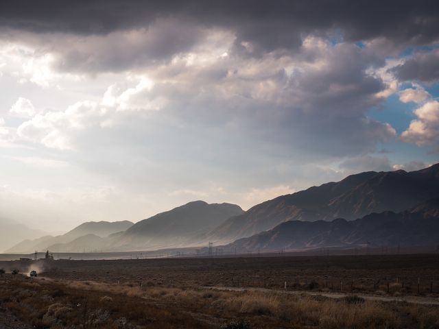 Scenic Desert Landscape with Dramatic Sky and Distant Mountains - Download Free Stock Photos Pikwizard.com