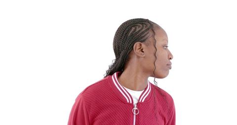 Confident Young Woman Wearing Red Jacket with Stylish Braids