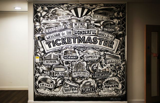 This black and white mural showcases Ticketmaster locations around the world. Ideal for use in marketing materials, travel brochures, and websites promoting international ticketing services and events. Great for illustrating the global reach of a company.