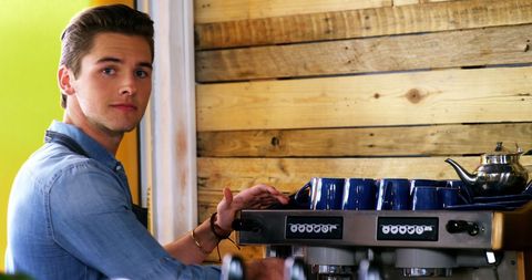 Barista in Cafe Preparing Espresso with Focus and Precision