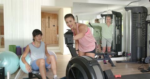 Diverse group engaging in lively fitness training session