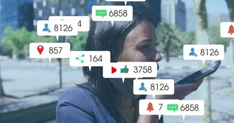 Businesswoman Engaging with Social Media Analytics in Urban Environment