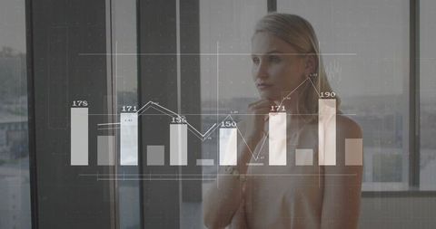 Contemplating business analyst with futuristic graphs and data overlays