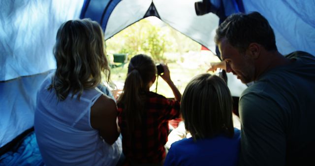 Family Enjoying Camping Inside Tent with Morning Sunlight - Download Free Stock Images Pikwizard.com