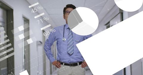 Doctor Analyzing Healthcare Data Visualization in Hospital Corridor