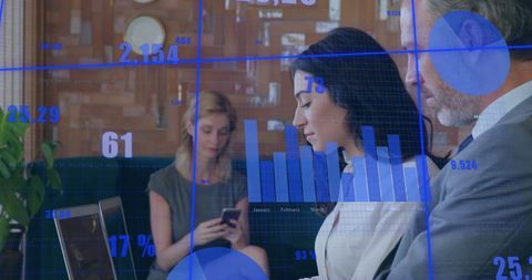 Diversified business team analyzing financial data